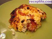 снимка 1 към рецепта Домати с яйца и сирене на фурна