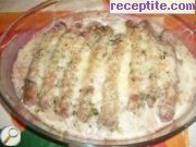 снимка 1 към рецепта Наденица на фурна с винен сос