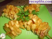 снимка 7 към рецепта Шишчета от пържени картофени цветчета