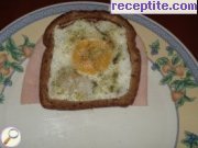 снимка 3 към рецепта Яйца в гнезда от хляб