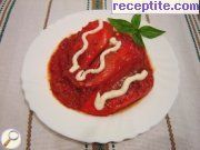 снимка 3 към рецепта Пълнени чушки с яйца и сирене в доматен сос