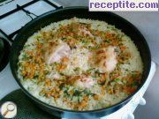 снимка 1 към рецепта Пилешко месо на фурна с ориз и грах