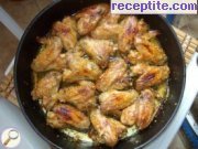 снимка 4 към рецепта Пилешки крилца с мед и бира