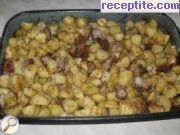 снимка 1 към рецепта Картофи на фурна с месо