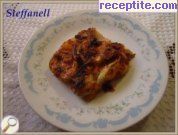 снимка 9 към рецепта Тиквички с лук и домати на фурна
