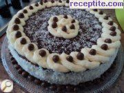 снимка 1 към рецепта Торта с готови блатове, шоколад и кокос