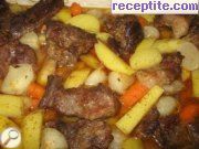снимка 5 към рецепта Свинско с картофи на фурна
