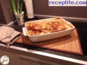 снимка 3 към рецепта Пилешки бутчета с картофи на фурна