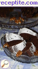 снимка 1 към рецепта Какаов сладкиш с орехи