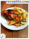 снимка 1 към рецепта Пилешки бутчета с картофи и лук на фурна