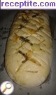 снимка 1 към рецепта Домашно чесново хлебче с розмарин и зехтин