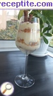 снимка 4 към рецепта Бисквитена торта Рафаело в чаши