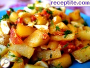 снимка 1 към рецепта Пържени картофи с яйца и домат