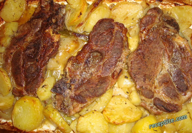 Снимки към Свински пържоли с картофи на фурна