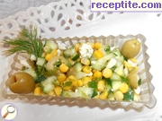 снимка 1 към рецепта Салата от краставици, царевица и синьо сирене