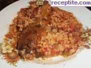 снимка 3 към рецепта Пилешко бутче с ориз на фурна