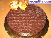 снимка 17 към рецепта Шоколадово-бисквитена торта