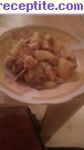 снимка 16 към рецепта Свинско с картофи на фурна