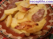 снимка 17 към рецепта Свинско с картофи на фурна