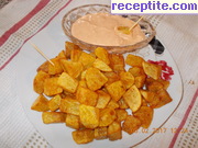 снимка 5 към рецепта Ароматни картофи с чеснов сос