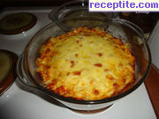 снимка 3 към рецепта Топла вечеря с кренвирши, яйца и сирене
