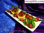 снимка 4 към рецепта Пълнени тиквички и домати с кайма