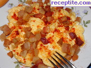снимка 2 към рецепта Пържени яйца със сланина