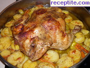 снимка 1 към рецепта Печено пиле с картофи, моркови и лимон