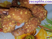 снимка 3 към рецепта Панирани пилешки кълки
