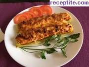 снимка 10 към рецепта Пълнени тиквички с яйца, сирене и чушка