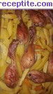 снимка 5 към рецепта Пилешки бутчета с хрупкави картофи на фурна
