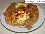 снимка 2 към рецепта Яйца на очи със стар лук