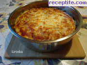 снимка 2 към рецепта Печени чушки със сирене и колбас