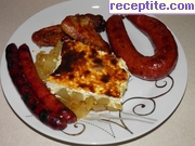 снимка 1 към рецепта Печени картофки с яйца и сирене