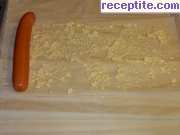снимка 4 към рецепта Хапки с кренвирш и сирене