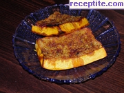 снимка 1 към рецепта Солена печена тиква с чесън