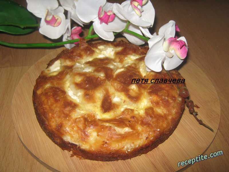 Снимки към Баница печена в гювеч под капак