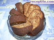 снимка 3 към рецепта Ябълков кекс с ядки и стафиди