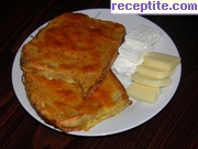 снимка 13 към рецепта Печени филии хляб с яйца и кисело мляко