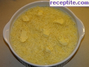 снимка 3 към рецепта Картофи със сирене на фурна