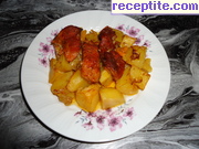 снимка 31 към рецепта Свинско с картофи на фурна