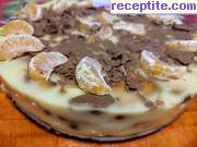 снимка 1 към рецепта Бисквитена торта с ванилов крем и мандарини