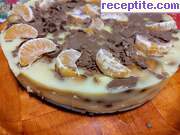 снимка 2 към рецепта Бисквитена торта с ванилов крем и мандарини