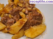 снимка 4 към рецепта Свински джоланчета с картофи на фурна