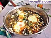 снимка 1 към рецепта Копривена яхния със сирене и забулени яйца