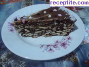 снимка 44 към рецепта Шоколадово-бисквитена торта